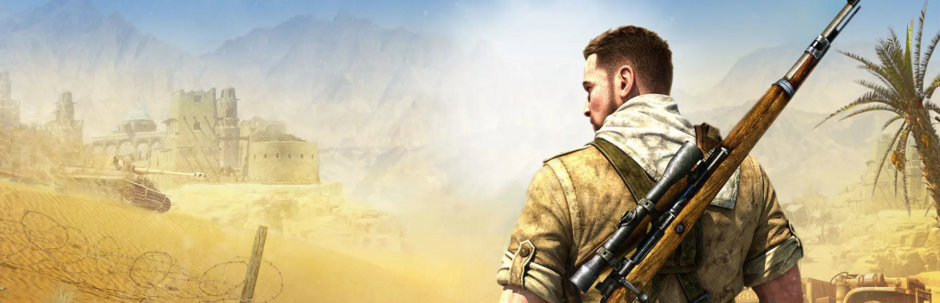 Sniper Elite 3 server hosting: sniper Karl Fairburne, rifle on his back, looks out over a sun-baked North African desert with a fortress and tanks